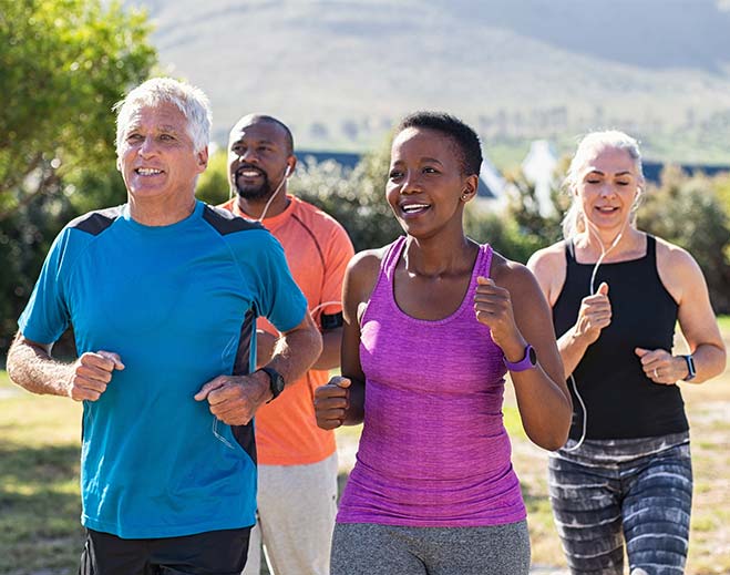 two couples running together